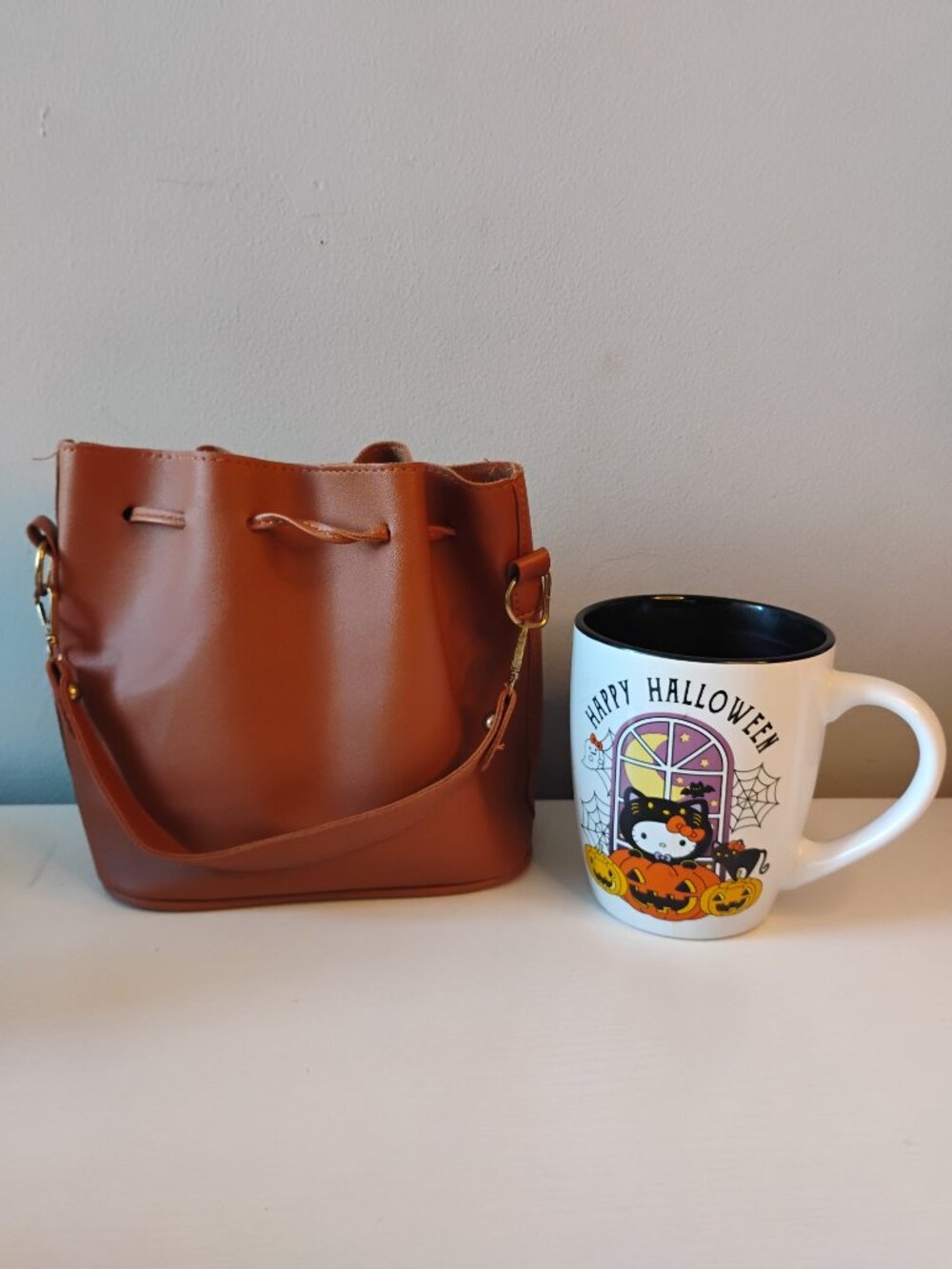 Mini drawstring bag with charm - Picture 5 of 12